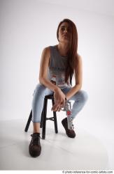 MOLLY SITTING POSE WITH GUN 2